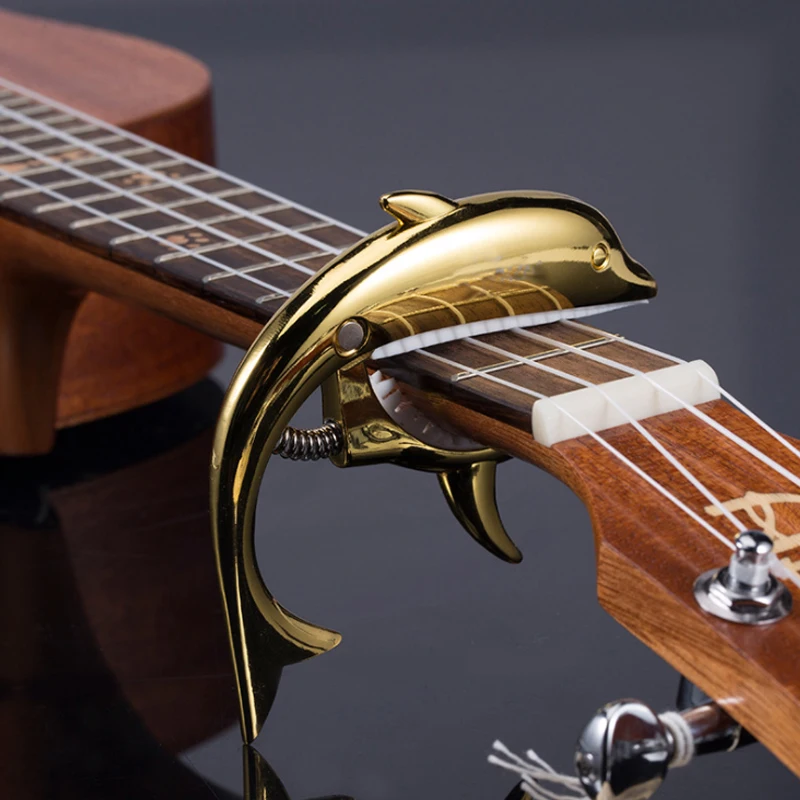 Guitar Capo Zink legering Delfin Form Capo Guitar Tilbehør Kit Akustisk Klassisk, Ukulele Tone Tilpasning Capo GP108 0